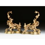 A GRAND PAIR OF REGENCE STYLE GILT BRONZE CHENETS, 19TH CENTURY, each cast as swirling berried