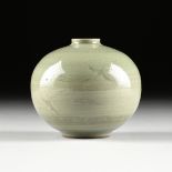 A KOREAN CELADON GLAZED EARTHENWARE OIL BOTTLE, IN THE GORYEO DYNASTY (918-1392) STYLE, the slightly