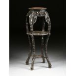 A TALL ANTIQUE CHINESE EXPORT BLACK LACQUERED CARVED WOOD PLANT STAND, ATTRIBUTED TO THE LATE QING