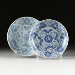 TWO CHINESE EXPORT BLUE AND WHITE GLAZED PORCELAIN PLATES, IN THE MING DYNASTY (1368-1644) TASTE,