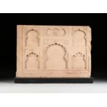 A PINK SANDSTONE CHINI KANA PANEL FRAGMENT, INDIA, MUGHAL EMPIRE (1526-1857), the cusped arches,