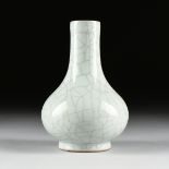 A SONG DYNASTY (960-1279) STYLE GUAN-TYPE BOTTLE VASE, CHINESE, glazed porcelain, of compressed