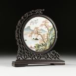 A FAMILLE ROSE PORCELAIN PLAQUE ON ROSEWOOD STAND, CHINESE REPUBLIC 1912-1949, signed, presented