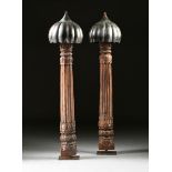 A PAIR OF INDO ISLAMIC CARVED WOOD COLUMNAR FLOOR LAMPS, 19TH CENTURY, each with a custom lobed