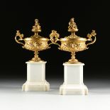 A PAIR OF ITALIAN NEOCLASSICAL STYLE GILT BRONZE LIDDED TAZZA URNS ON STAND, MID/LATE 19TH