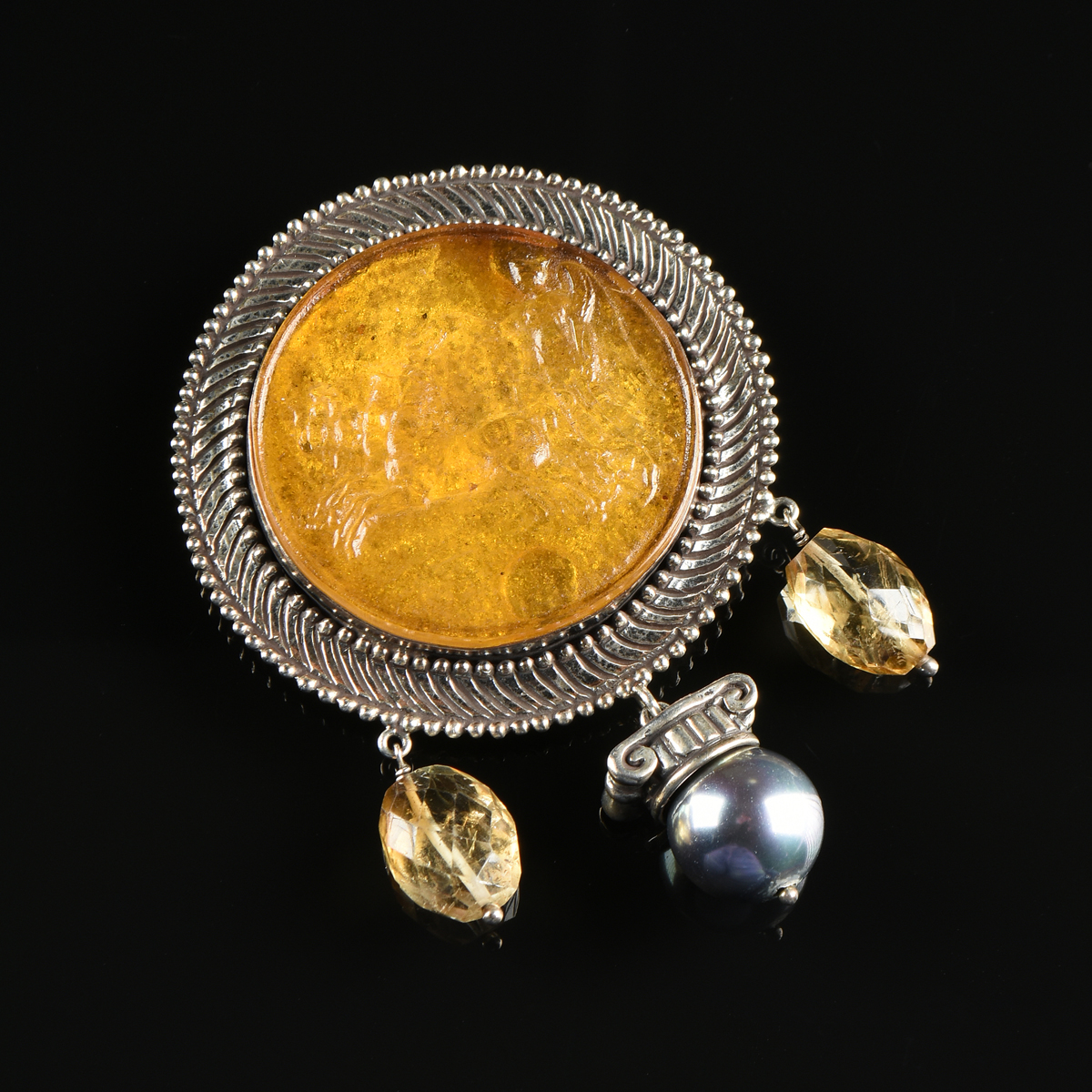 AN AD MAIOREM DEI GLORIAM STERLING SILVER BROOCH BY REBECCA COLLINS, the gadrooned and beaded