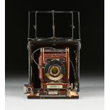 AN ANTIQUE AMERICAN KORONA V. CAMERA, CIRCA 1905, the mahogany camera mounted with a Gammax No. 2