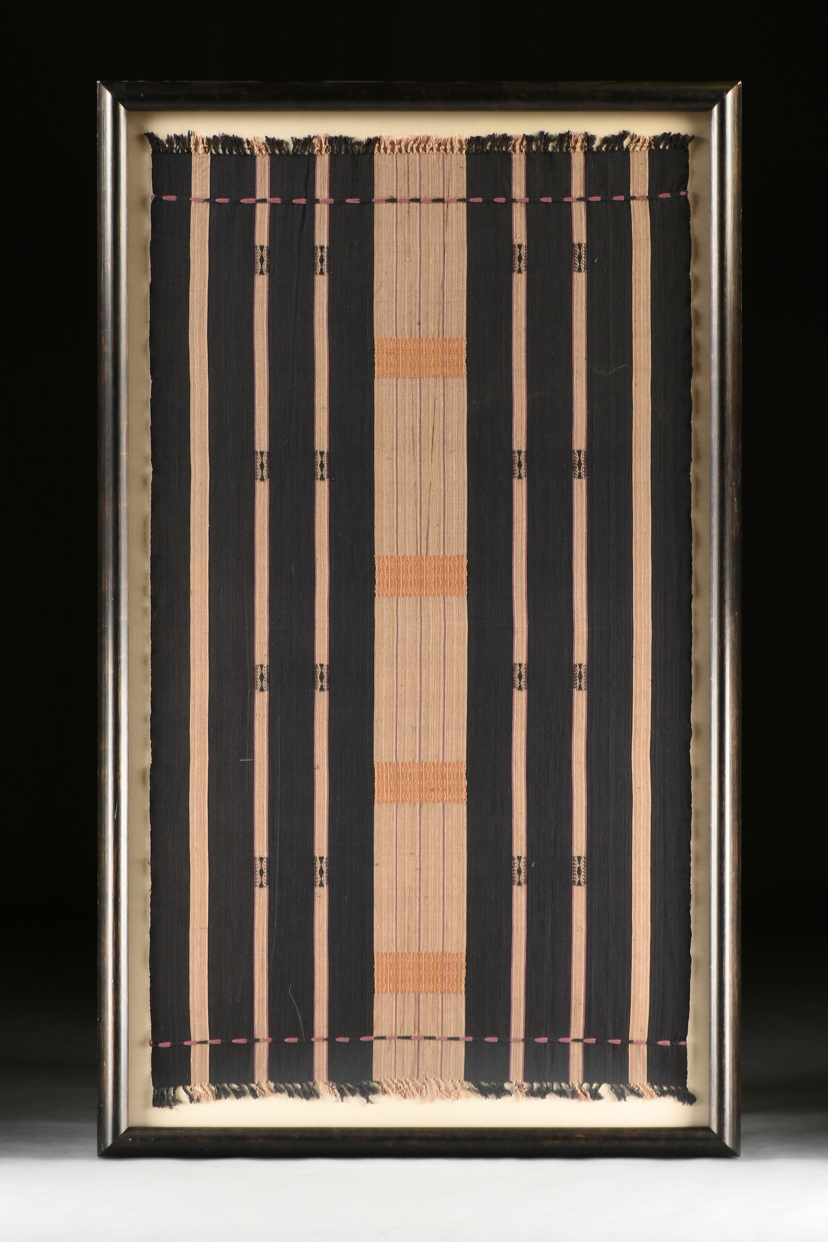 A NAGA FINELY LOOMED BLACK AND TAN STRIPED COTTON WOMAN'S ANGAMI SHAWL, NAGALAND, SECOND HALF 20TH