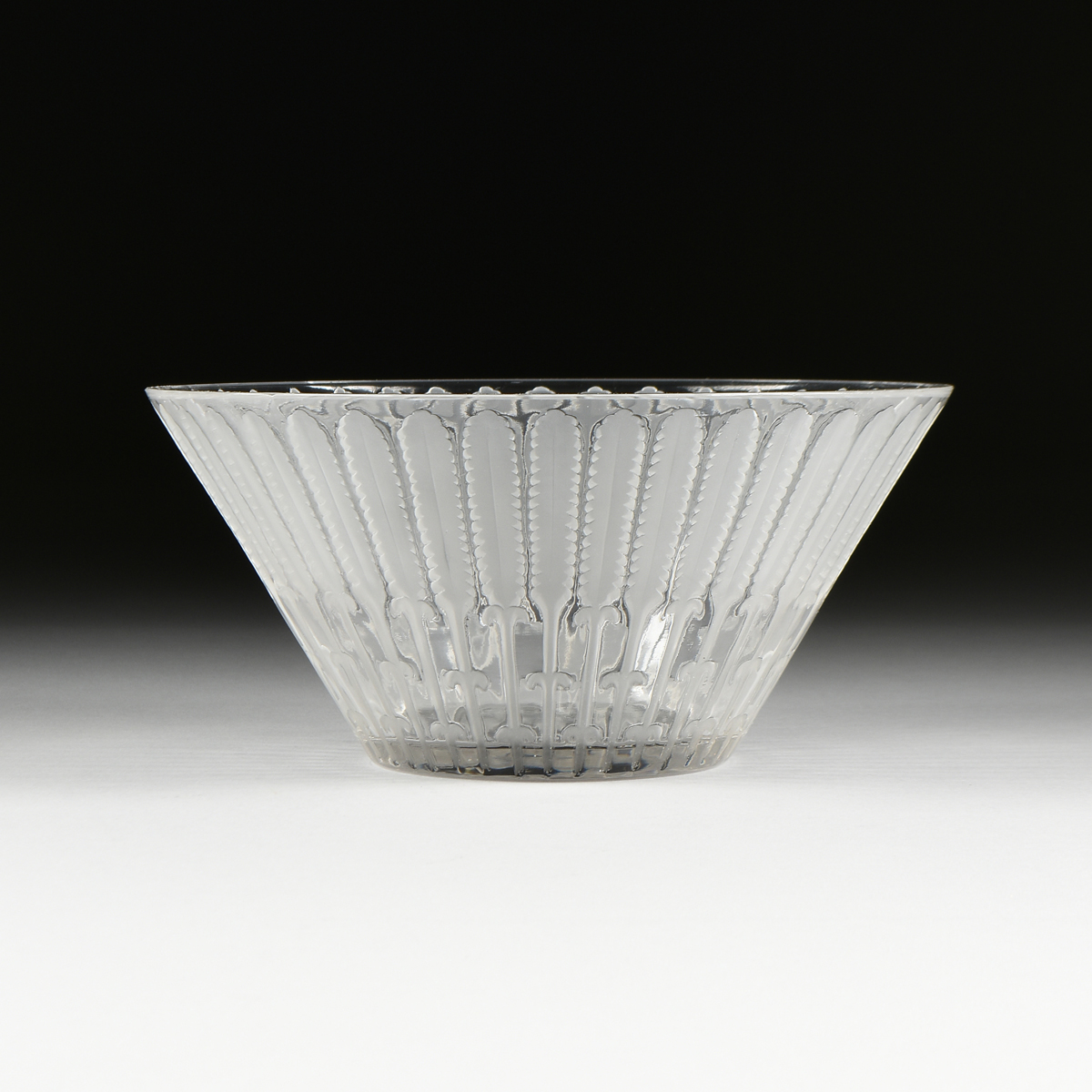 A LALIQUE FROSTED AND CLEAR GLASS FRUIT BOWL, ENGRAVED SIGNATURE, CIRCA 1960, of circular form