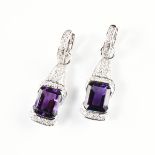 A PAIR OF 18K WHITE GOLD, AMETHYST, AND DIAMOND LADY'S EARRINGS, measuring 1 1/2? in overall length,