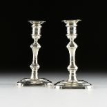 A PAIR OF CARTIER STERLING SILVER WEIGHTED CANDLESTICKS, FIRST HALF 20TH CENTURY, in the Georgian