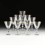 A GROUP OF TWENTY SIX PARCEL GILT RIM CUT CRYSTAL STEMWARE, 20TH CENTURY, comprising ten wine