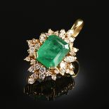 AN 18K YELLOW GOLD, EMERALD, AND DIAMOND LADY'S PENDANT, the mounting centering a square cut emerald