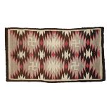 A NATIVE AMERICAN CRYSTAL TRADING POST STYLE BUTTERFLY AND WHIRLING LOG RUG, EARLY 20TH CENTURY,