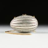 A CHIC JUDITH LIEBER CLEAR AND RED RHINESTONE INLAID EVENING CLUTCH PURSE, SIGNED, CIRCA 1984, of
