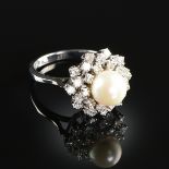 A 14K WHITE GOLD, AKOYA CULTURED PEARL, AND DIAMOND LADY'S RING, the mounting centering a 7.78 mm