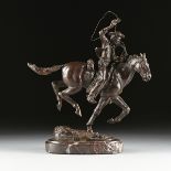 LE ROY (20th Century) A SCULPTURE, "The Wrangler," CIRCA 1975, cast bronze on a rouge marble base,