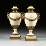 A PAIR OF LOUIS XVI STYLE BRONZE MOUNTED WHITE MARBLE URN LAMPS, EARLY 20TH CENTURY, each of ovoid