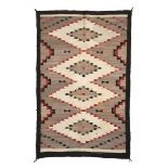 A NATIVE AMERICAN GANADO OR KLAGETOH STYLE RUG WEAVING, NAVAJO, EARLY/MID 20TH CENTURY, dyed wool, a
