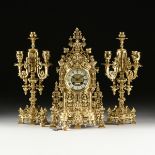 A FRENCH JAPY FRERES WORKS GOTHIC REVIVAL GILT BRASS THREE PIECE GARNITURE, NAPOLEON III (1852-