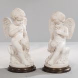 Pair of Carrara Marble Figures on Bronze Bases, Italy, 20th century, modeled as winged cherubs