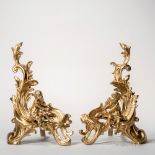 Pair of Louis XV-style Gilt-bronze Chenets, modern, decorated with putti seated on stylized