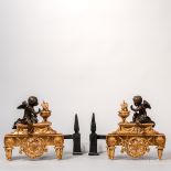 Pair of Louis XV-style Patinated- and Gilt-bronze Chenets, France, late 19th century, depict Eros