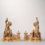 Pair of Gilt-bronze Chenets, modern, putti wreathed with garlands of grape leaves, one holds a