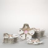 Set of Eleven Limoges Porcelain Oyster Plates, France, 19th century, with gilt trim, mottled gray-