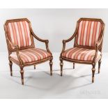 Pair of Louis XVI-style Fauteuil, 20th century, edges of frame carved and gilded, set on turned