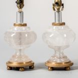 Pair of Louis XVI-style Rock Crystal Lamp Bases, 20th century, bulbous shapes with dore bronze