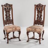 Set of Twelve Walnut Side Chairs in the Style of Daniel Marot, late 19th century, crest rails carved
