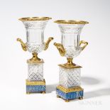 Pair of Neoclassical Bronze and Cut Glass Urns, campana shape set on a raised rectangular plinth