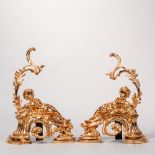 Pair of Gilt-metal Chenets, modern, the reclining putti with grapes and wheat, ht. 20, wd. 14, dp. 5