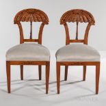 Set of Eight Charles X-style Side Chairs, curved and ribbed crest rails, decorated with band of