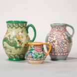 Three Charlotte Rhead Design Pottery Jugs, England, 1930s-40s, each polychrome enamel decorated, a