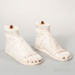 Pair of Italian Carrara Marble Feet, carved wearing sandals, lg. 15, ht. 8 in. Estimate $1,000-1,500