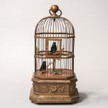 Birdcage Automaton, 20th century, brass cage set atop a giltwood base, two singing birds to