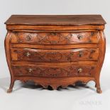 French Provincial Walnut Commode, 18th century, serpentine front, three drawers carved with entwined