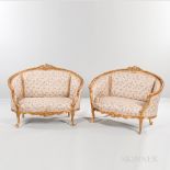 Pair of Louis XV-style Carved and Gilded Canapes, modern, curved crest rails with carved floral