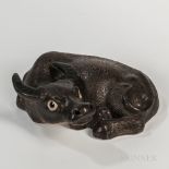 Black-glazed Ceramic Water Buffalo, China, reclining to one side with its head slightly upwards, in