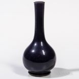 Aubergine-glazed Bottle Vase, China, possibly 18th century, with a long slender neck and banded rim