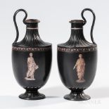 Pair of Wedgwood Encaustic Decorated Black Basalt Ewers