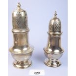 Two silver sugar casters - 350g, London 935 and London 1970