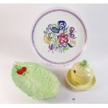 A Carlton Ware buttercup sugar bowl and lid, a leaf dish and a Poole plate