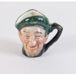 A Royal Doulton miniature toby jug