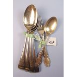 Four silver dessert spoons Sheffield 1923 205g and a silver christening spoon and fork Sheffield