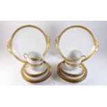 A Haviland Limoges tea service comprising: five gilt edged cups, six saucers, six teaplates and