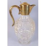 A Mappin and Webb cut glass claret jug with silver mounts