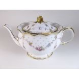 A Royal Crown Derby Royal Antoinette tea service, pattern number A1225, comprising: eight cups and